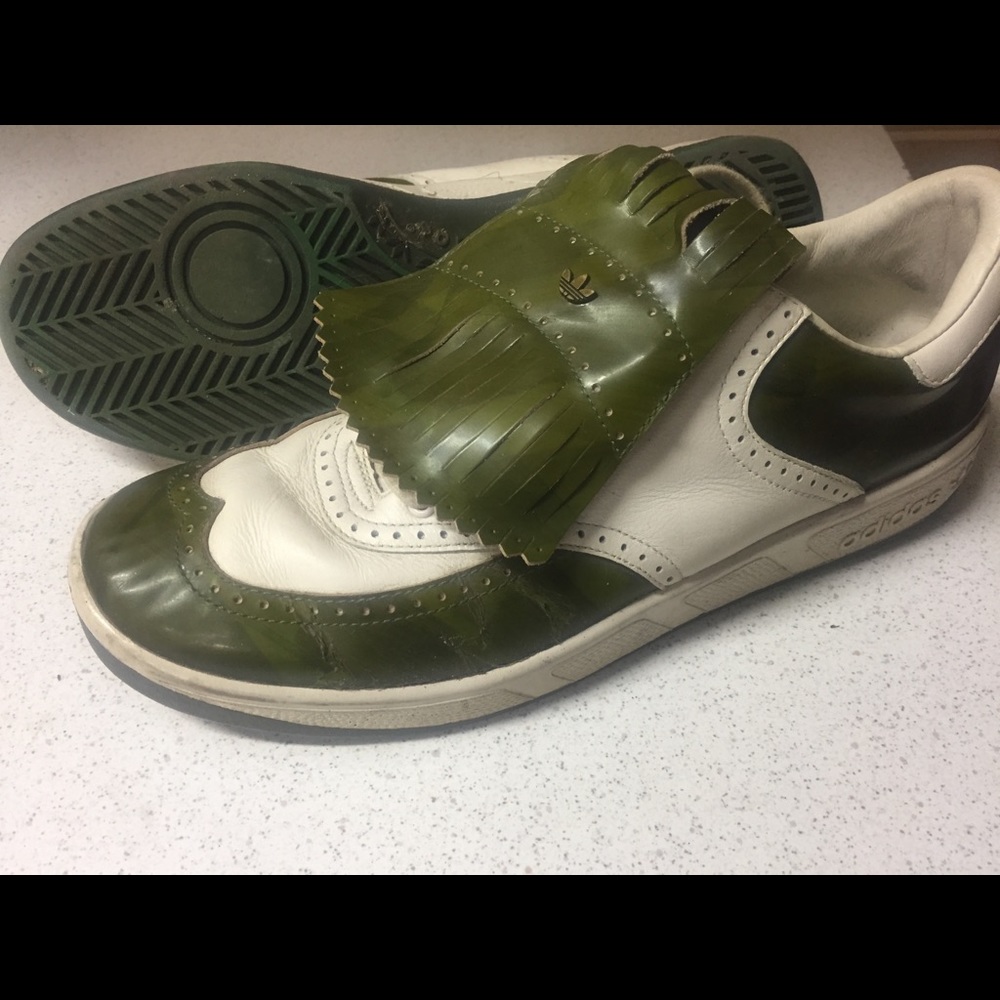 Vintage Adidas Country Club sneakers.